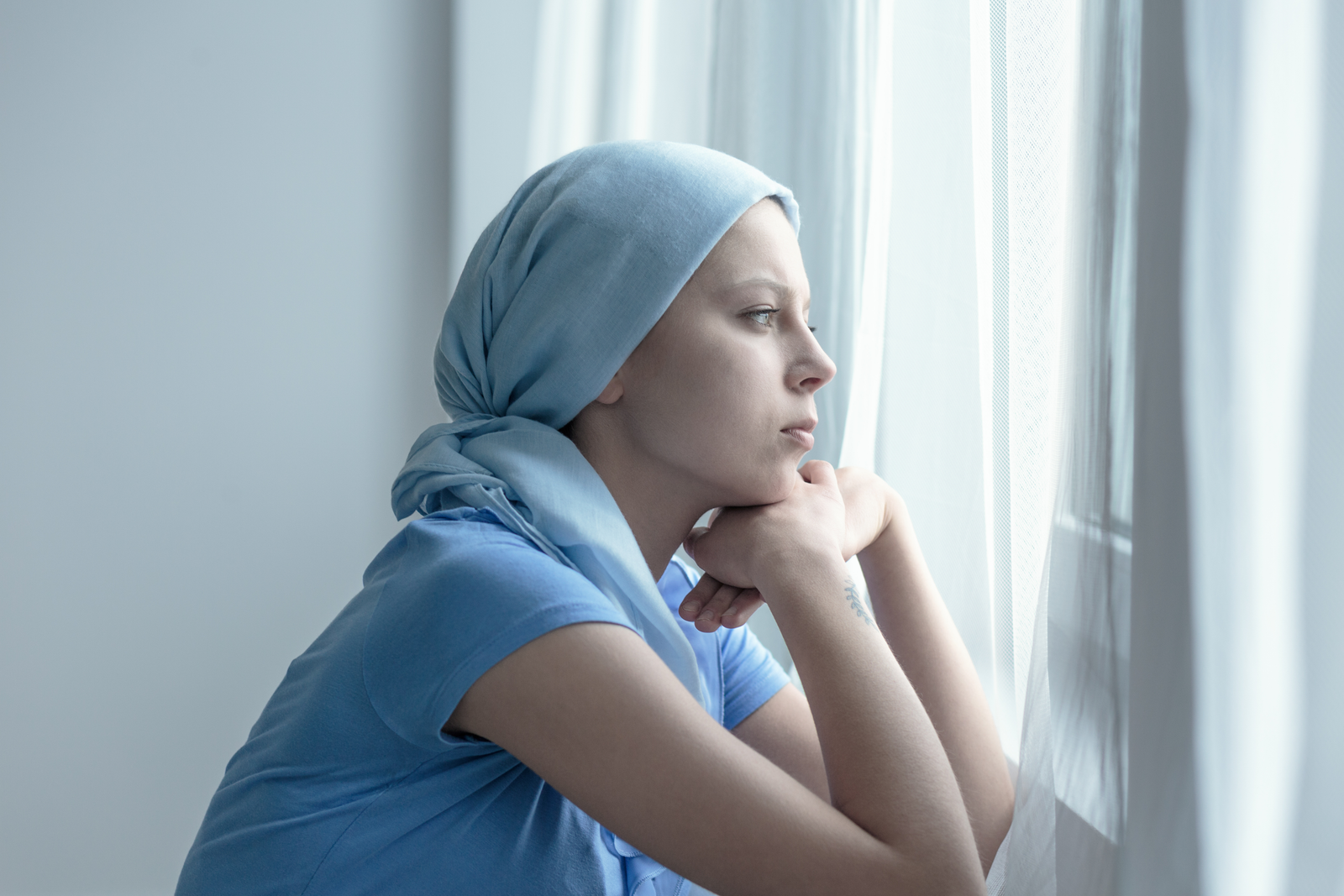 Person feeling alone or unsupported after a cancer diagnosis